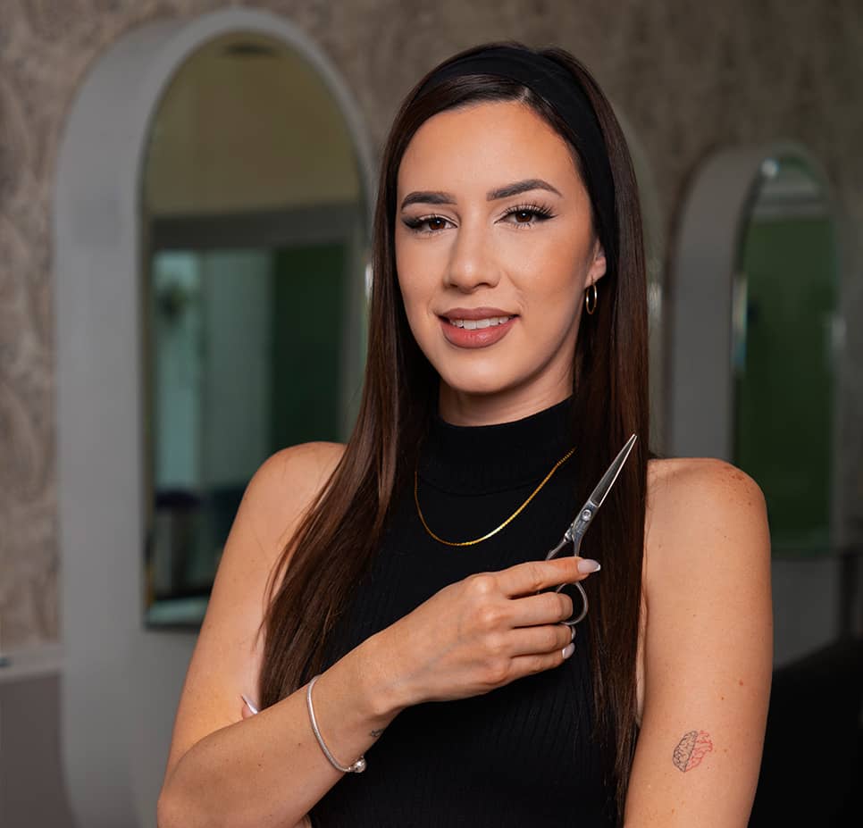 smiling-beauty-worker-holding-scissors